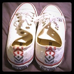 Low type red, white, and blue Converse.